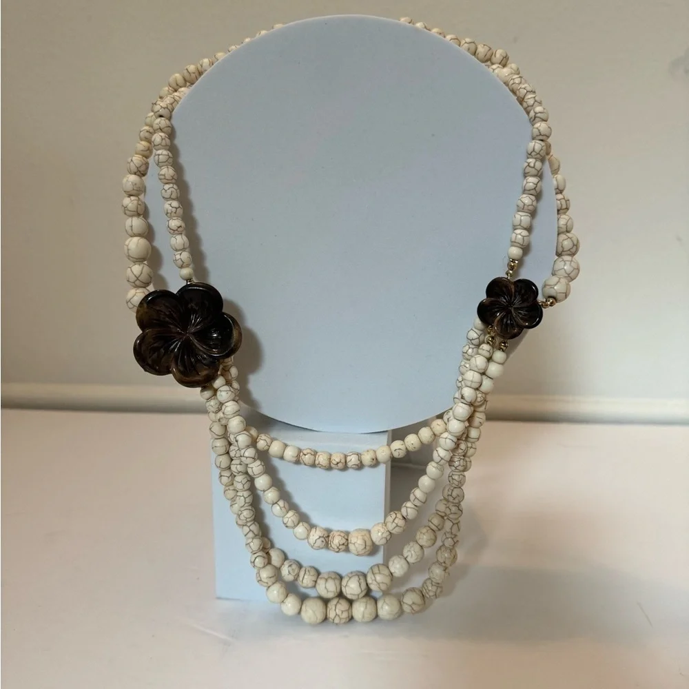 Gorgeous earth tone beaded necklace with brown floral accents
